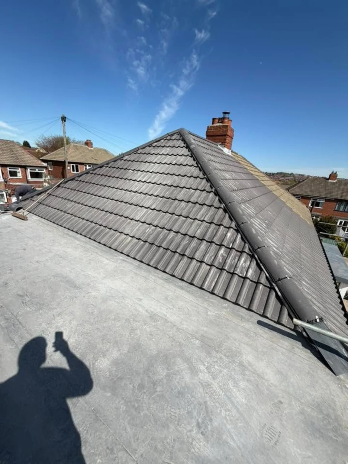 Completed grey tiled roof